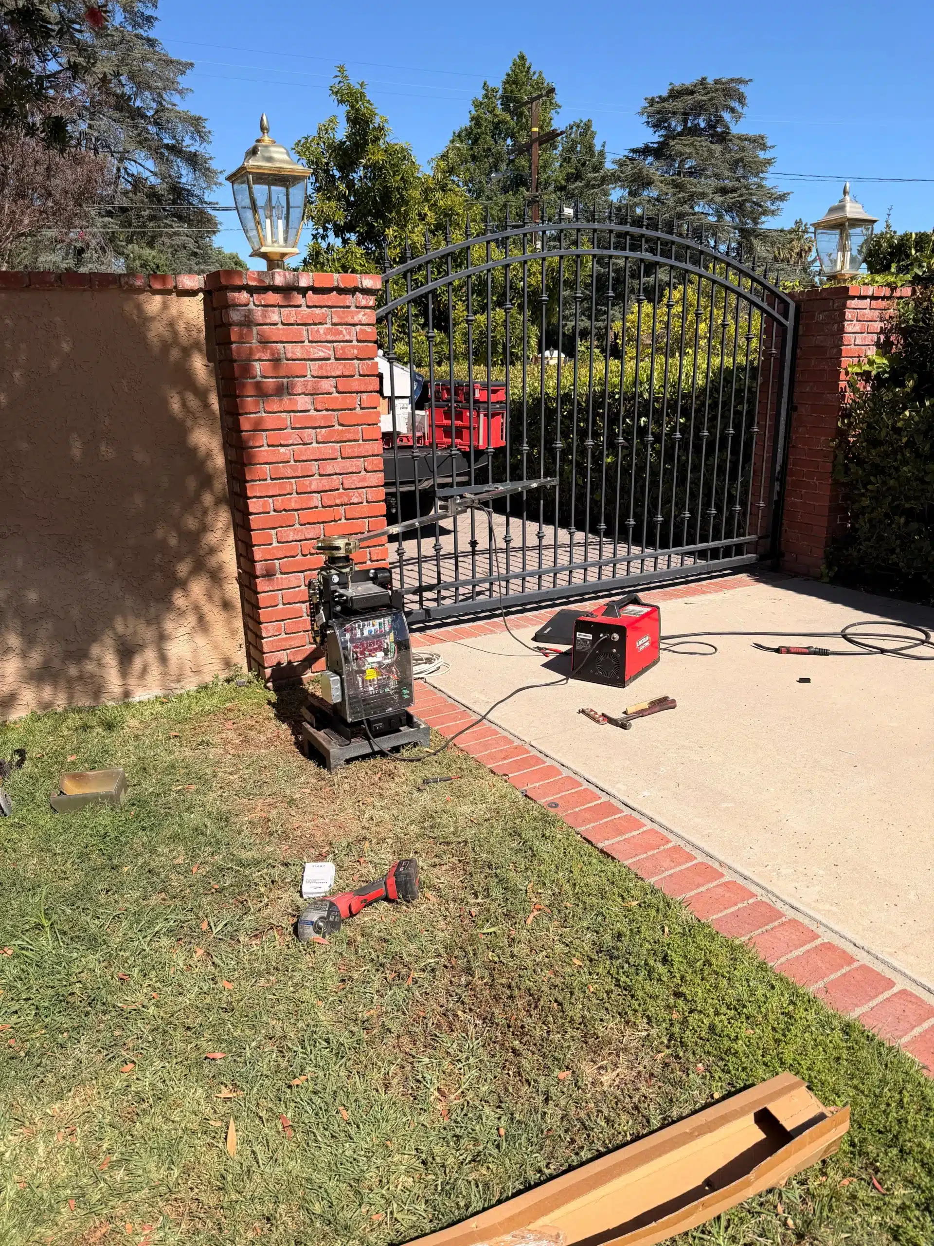 Technician performing gate motor repair in Calabasas, CA
